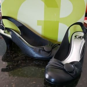 NWB black strapped mules with bow detail